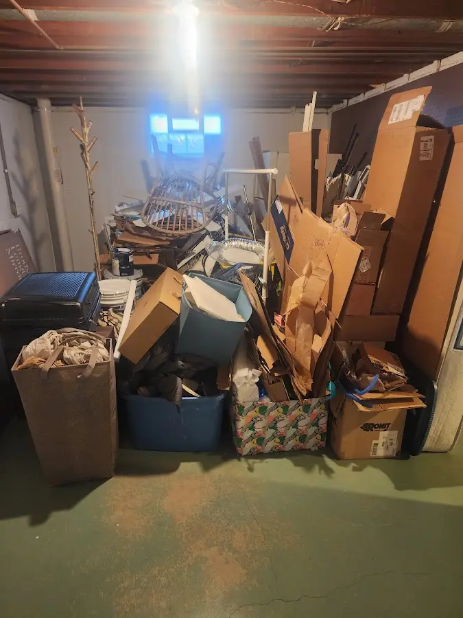 Roll-off dumpster container at job site for 4 Yard Dumpster Rental in Waterloo